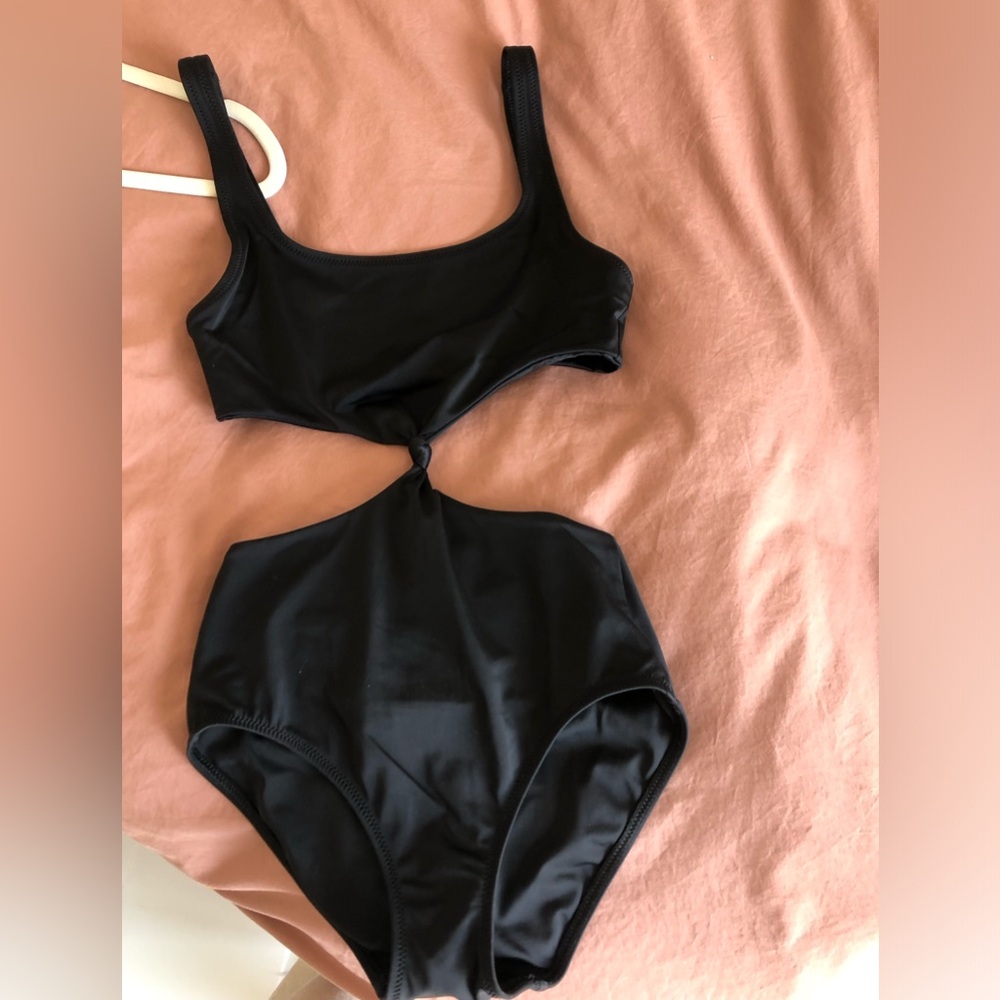 Solid and Striped size XS one piece cutout swimsuit